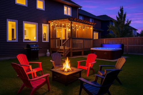 West Edmonton Apartment | Outdoor Oasis-Hottub-BBQ-Firetable-AC-KingBd-85in TV