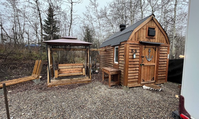 Mountain View House | Payne Lake Wilderness Huts - Camper A18n A cozy camper near a quiet lake!