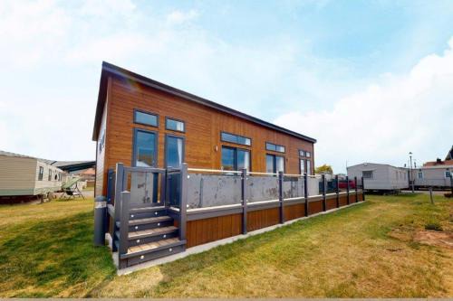 Towyn House | Pebble Beach Resort The Goodwood Lodge