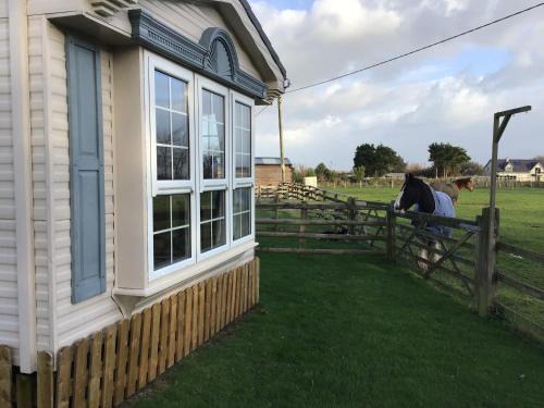 Newborough House | Pen llyn holiday cottages and caravan