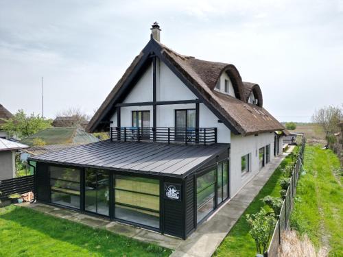 Crisan House | Pensiunea Pescarul Vanator Delta Dunarii