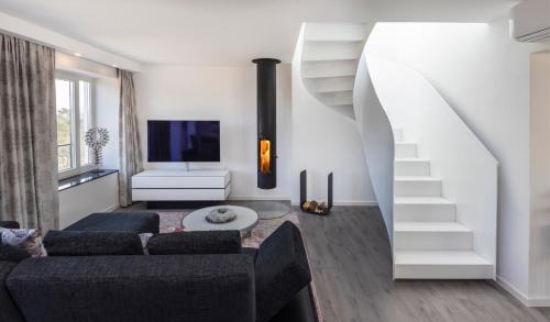Prora Apartment | Penthouse mit Kamin, Dachterrasse, Meerblick, Gasgrill, Klimaanlage, Luxus-Design-Apartment, 2 Minuten zum Strand