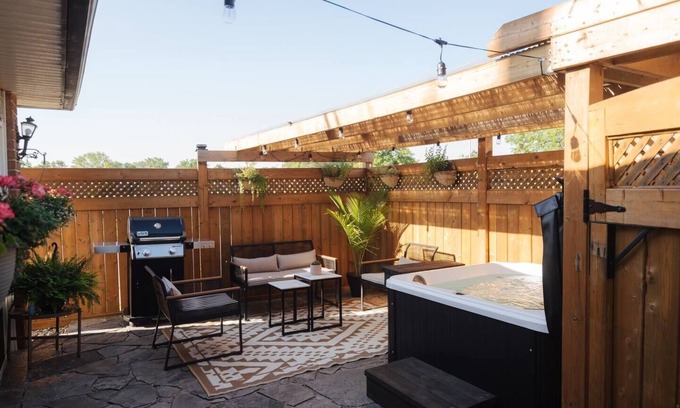 Riverside House | Perfect hideaway with a hot tub and a fireplace