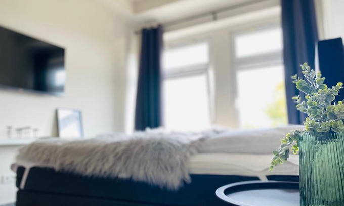 Cuxhaven House | Pier 1 bis 4 gmütliche Zimmer mit Boxspringbett