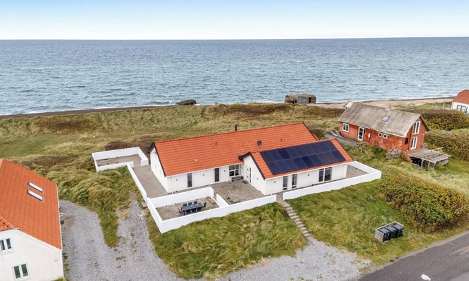 Lild Strand House | Pool and activity house with a 180-degree view of the North Sea, located at.