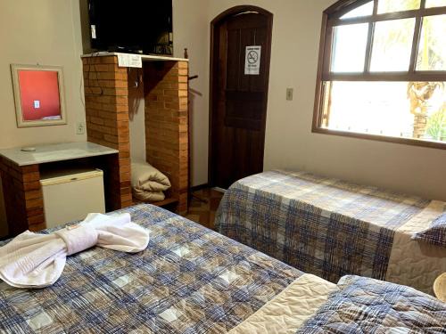 Quatis Hotel | Pousada Por do Sol