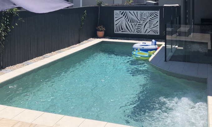 Mudjimba House | Pristine beaches, private seasonal heated pool and pet friendly