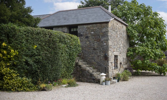 Carnhell Green Cottage | Quaint and cosy, this reverse layout barn conversion exudes original charm and ultimate luxury. Quin