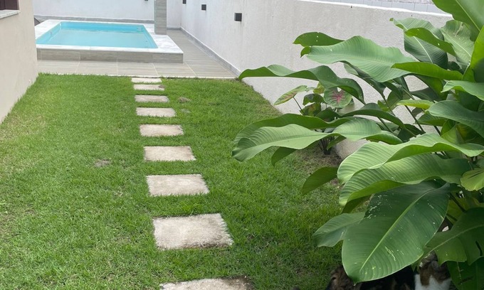 Aratuba House | Quarto cama queen ar condicionado