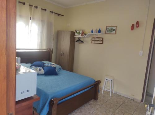 Holambra House | QUARTO CONFORTAVEL COM GARAGEM