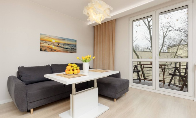 Baluty Apartment | Rajska 13 | Balcony and bedroom | Łódź