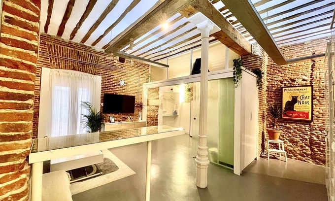 Atocha Apartment | Red brick loft sleeps 6-8 Lavapies Heart
