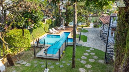 Itanhanga House | Refúgio da ilha: 6 suítes, piscina e churrasqueira
