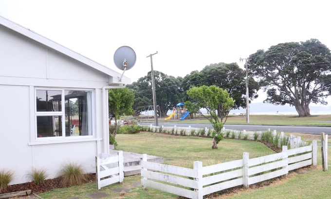 One Tree Point House | Relax Swim Boat Fish Explore at our classic family friendly kiwi beach bach
