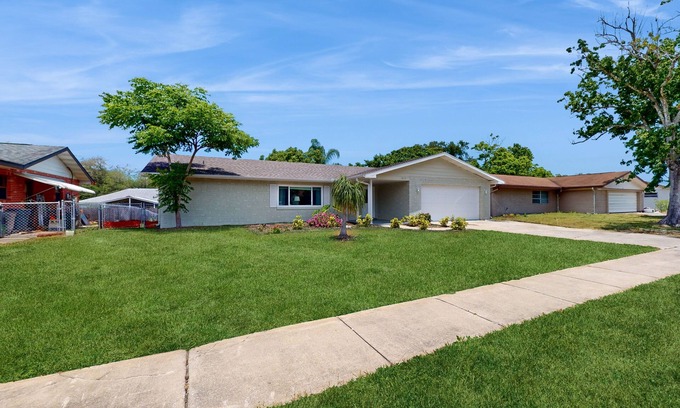 Port Orange House | Relaxing, single-level home with a sunroom, large yard, central AC, & fast WiFi