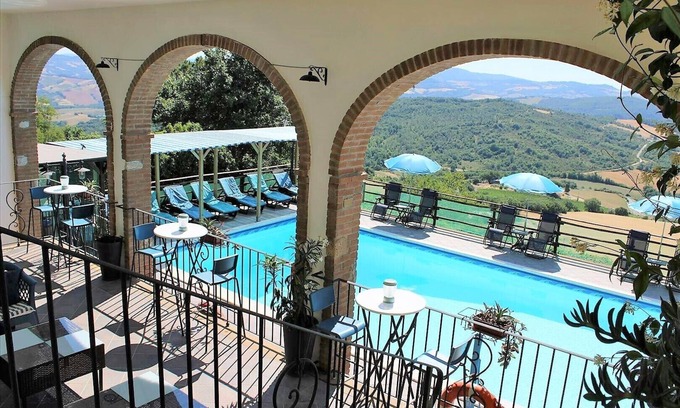 Montecastelli House | Renovated farmhouse with 7 apartments in the center of Tuscany.