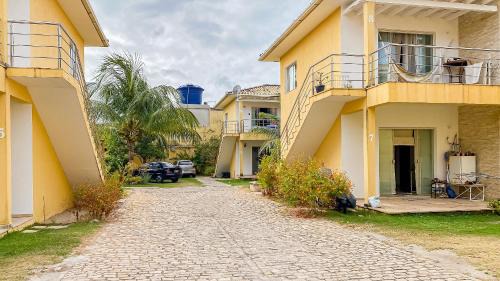 Taperapua Beach House | Residencial IL Pevero, condomínio com piscina e área gourmet a uma quadra da Praia de Taperapuã aptos com 2 quartos