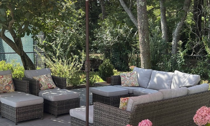 East Quogue House | Resort-like home with NEW KITCHEN, private tennis court, heated pool, & hot tub
