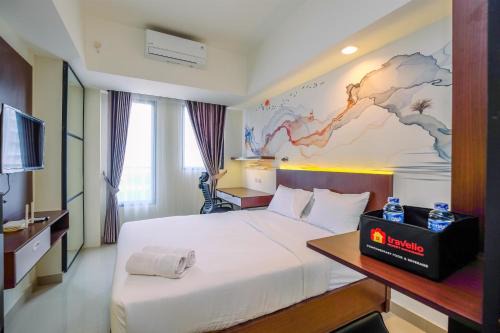 Pondokcina Apartment | Restful and Tidy Studio at Evenciio Margonda Apartment By Travelio