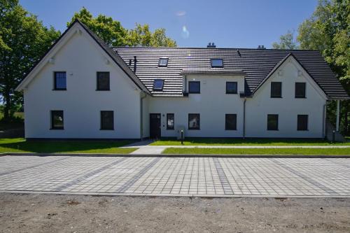 Lobbe Apartment | Rex Rugia FeWo17-5 mit Schwimmbad und Saunanutzung im AHOI-Erlebnisbad Sellin