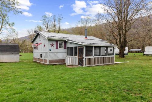Points Ski Chalet | Riverfront Cabin Wood Stove Fire Pit & Grill