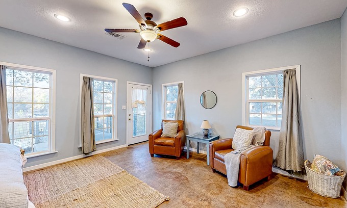 China Spring House | Riverfront guest house with private patio, river views, washer/dryer, streaming