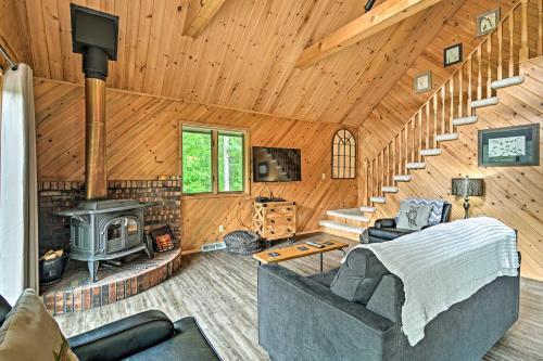 Mayfield House | Riverfront Traverse City Cabin Near Snowmobiling!