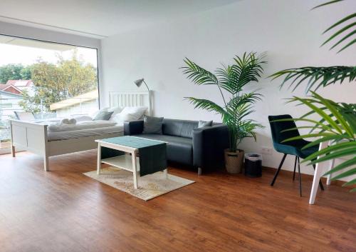 Langenau Apartment | Rooftop Apartments - Modernes Studioapartment für 3 Personen