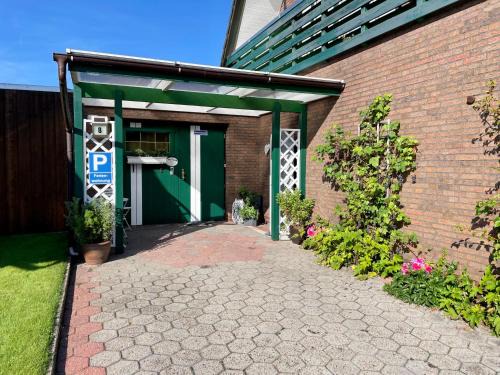 Westerstede Apartment | Ruheoase im Grünen - Komfortable Ferienwohnung am Wulfskamp, Westerstede