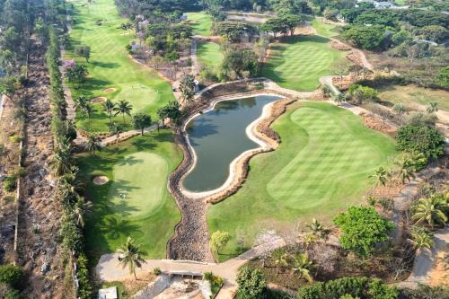 Kodalagurki Villa | SaffronStays Niranta- Villa on golf course near Bangalore
