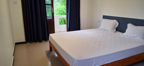 Payagala House | Sandy Steps