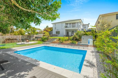 Culburra Beach House | Sea La Vie - Pet Friendly with Fireplace and Swimming Pool & Spa