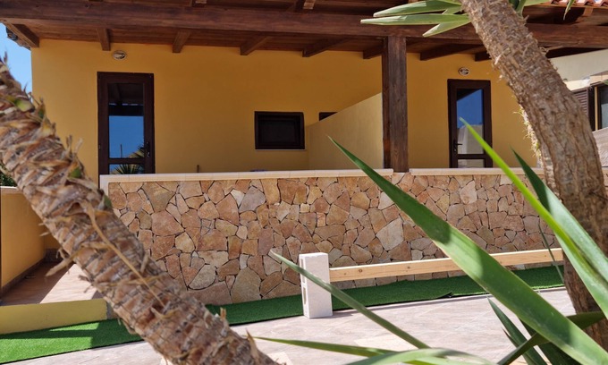 Lampedusa Condo | Seaside apartment with barbecue and outdoor furniture