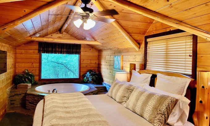 Eureka Springs Cabin | Secluded Hideaway Cabin boasting Wrap-Around Deck and Jacuzzi for two! Trail & Cave on property!
