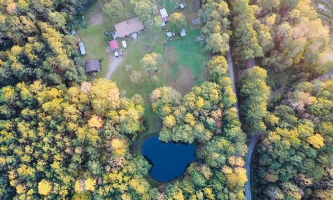 Apex House | Serene Log Home w pond, fenced-in yard & pastures