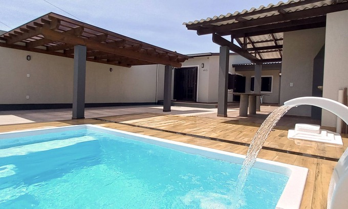 Capao da Canoa House | Single House On The Patio With Two Bedrooms And Wi-Fi In Capão Da Canoa