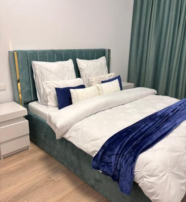 Bistrita Apartment | Smile - BrandNew Apart with FreeUndergroundParking, large Balcony, near Shopping Centers
