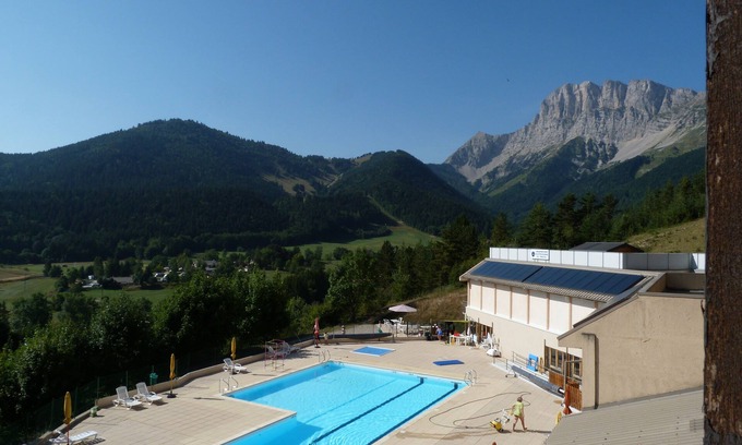 Gresse-en-Vercors Apartment | South-facing apartment overlooking the mountains. Nearby swimming pool and ski slopes