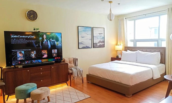 Sasa Apartment | Spacious 36sqm Studio with 65" TV Netflix Karaoke and Pool Access Near Airport and Samal Ferry