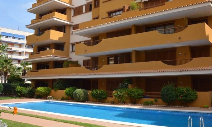 Punta Prima Apartment | "Spacious ground floor apartment" with Shared Pool, Terrace & Wi-Fi