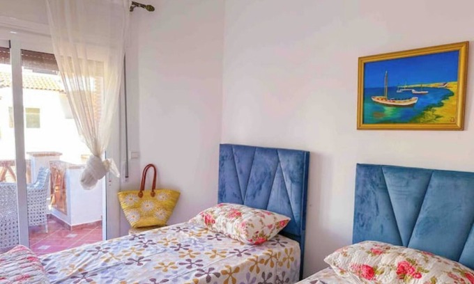 Oued Laou Apartment | Spacious terrace, pool and access to the sea.