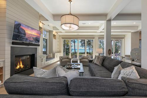 Brockway House | Spellbound Lakefront Lodge by Tahoe Getaways - 5 BR w Hot Tub, Buoy & Beach access