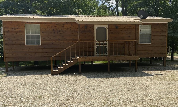 Mammoth Spring Cabin | Spring River Cabin at Saddler Falls with large yard, firepit and swing!