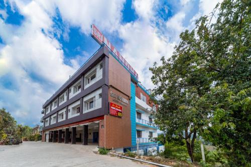 Valparai Hotel | Sri Nandha Luxury Comforts