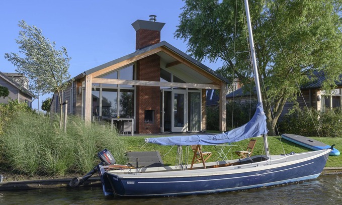 Akkrum House | Stay in our energy-neutral Eneva 4 bungalow, with private jetty.