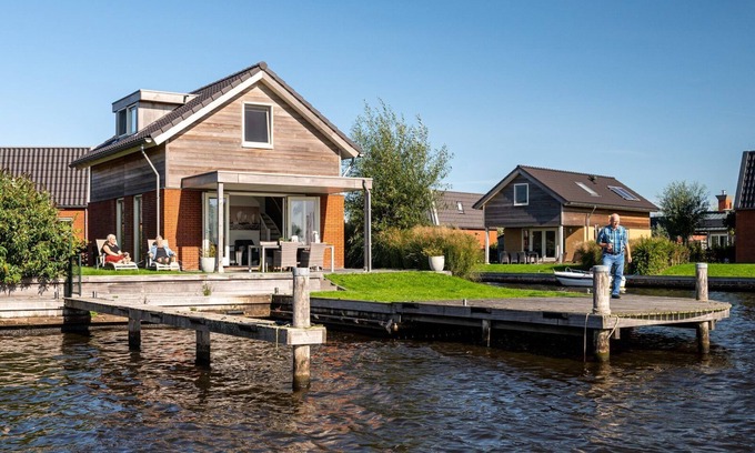 Akkrum House | Stay in our spacious Sneekermeer 4 home with private jetty.