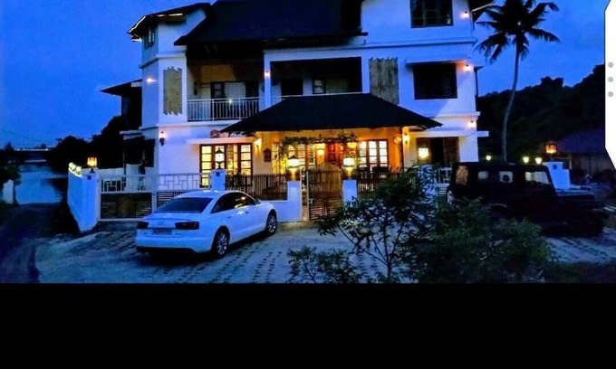 Kakkanad House | Stay In the city. But in a village ambience. Over looking the forest