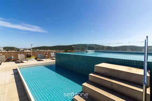Passagem Apartment | Stay with pool and sauna just steps from the beach in Cabo Frio - HSC