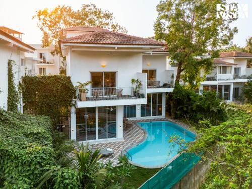 Mandrem Villa | StayVista at Aroha Palms Paradiso - Pool, Wi-Fi