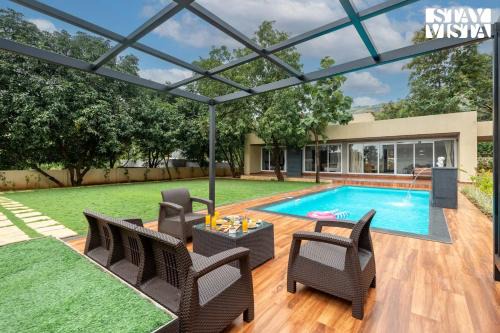 Karjat Villa | StayVista at Gulposh Retreat with Pool, Lawn & Gazebo